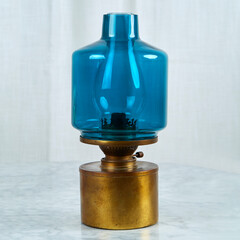 Fototapeta na wymiar Blue Glass 1950s Scandinavian Modern Oil Lamp. 