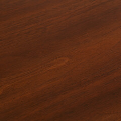 Woodgrain texture from a dark wood mid-century modern table. Diagonal wood pattern. 