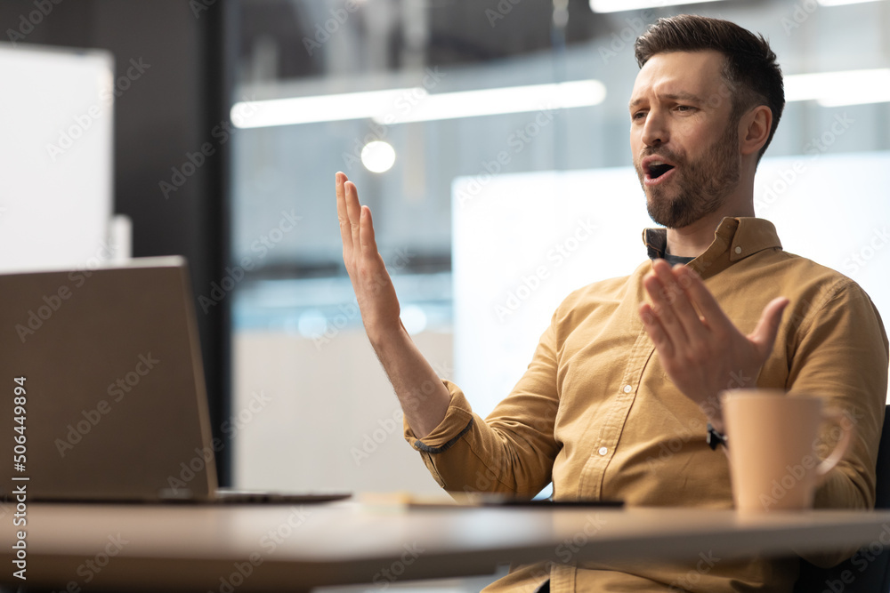 Poster discontented business man making video call having problem in office