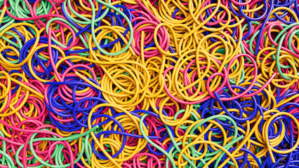 Background covered with a pile of tangled colorful candy wires. 3d render illustration