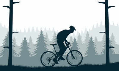 man riding bike in forest