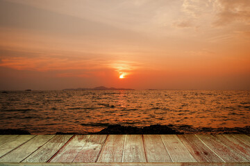 Fototapeta na wymiar Tabletop Against Seascape at Sunset background.