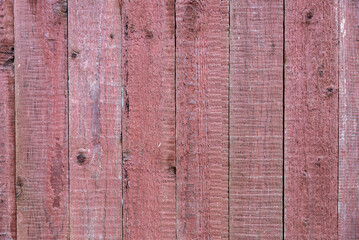 high quality photo of a red painted texture background made from raw wood planks