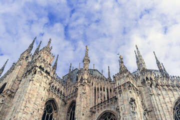 Wall of the famous Cathedral of the Nativity of the Blessed Virgin Mary in Milan, Italy, under a...