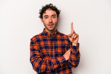 Young caucasian man isolated on white background having some great idea, concept of creativity.