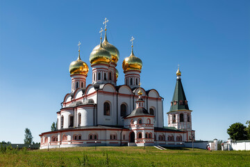 Fototapeta na wymiar Assumption Cathedral of the Valday Iversky Monastery on a sunny summer day. Novgorod Region, Russia