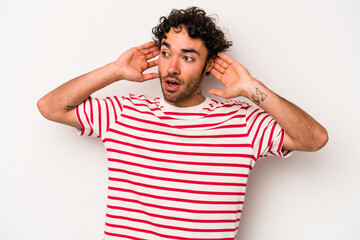Young caucasian man isolated on white background screaming, very excited, passionate, satisfied...