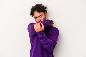 Young caucasian man isolated on white background having a neck pain due to stress, massaging and touching it with hand.