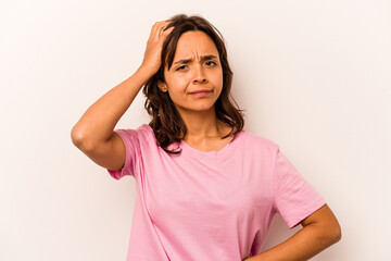 Young hispanic woman isolated on white background being shocked, she has remembered important...