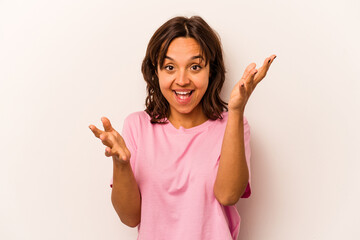 Young hispanic woman isolated on white background feels confident giving a hug to the camera.