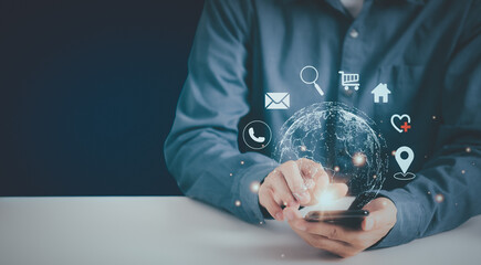 Businessman using smartphone connection on globe icon network, digital technology, internet of things, connection network wireless devices, digital hologram technology