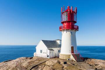Lindesnes Lighthouse, Lindesnes fyr, a coastal lighthouse at the southernmost tip of Norway, - obrazy, fototapety, plakaty