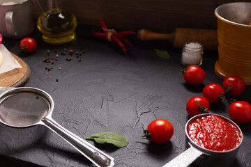 Chilly pepper and tomato sauce ingredient for homemade ketchup at table. Chilli and food - 506466420