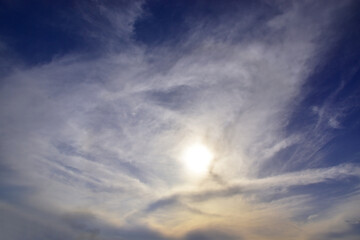Spring sunset in light clouds