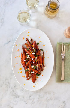 Roasted Carrots on white marble