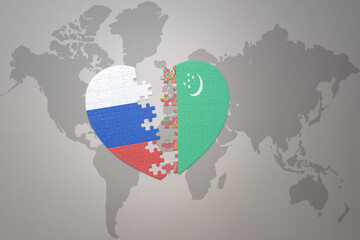 puzzle heart with the national flag of russia and turkmenistan on a world map background. Concept.