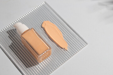 mockup of perfume skin care bottle cosmetic tube of beauty makeup facial, treatment cleanser face foam, beauty healthcare branding packaging in water splash