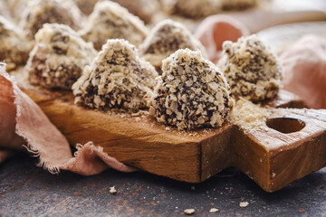 Handmade sweets candies on a wooden boards for dessert and treat. Homemade sweets. Shallow depth of field