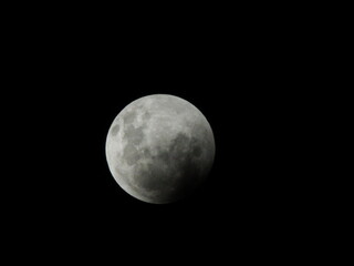 Obraz na płótnie Canvas full moon over black