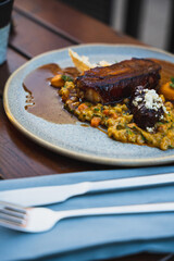 gourmet pork and vegetables dish