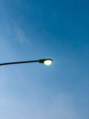 street lamp on blue sky