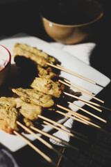 Pork satay served in the morning in the sunshine.