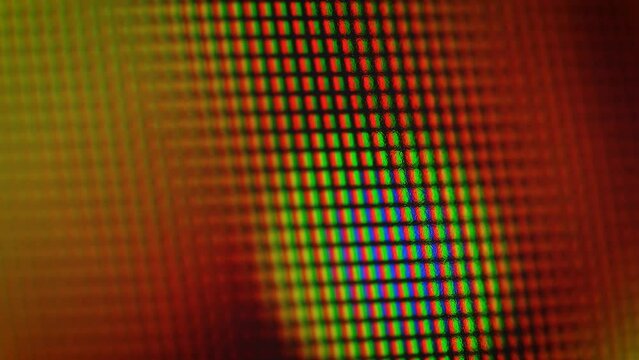 Abstract patterns of colored light from pixels, soft focus for background