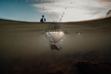Fishing Lure landing in water