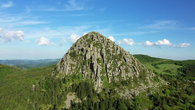 The imposing and green Mont de Gerbier de Jonc in Europe, France, Ardeche, in summer, on a sunny day.