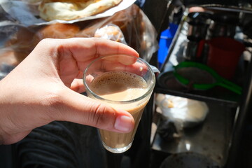 Girl having indian Chai
