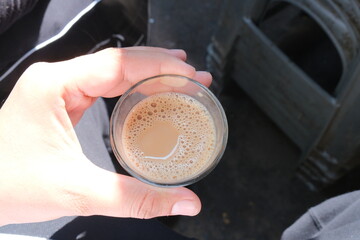 Girl having indian Chai
