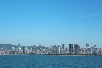 Naklejka premium Istanbul Islands, island landscapes, seagulls, cargo ships and sailboats in the sea, black-winged seagulls soaring from the sky, Adalar Istanbul Turkey