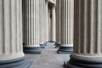 Abstract view of lots of embossed columns with deep shadows, looking like lots of vertical lines