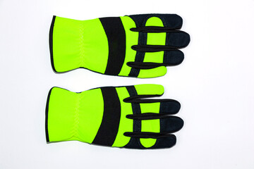 Protective work gloves on a white background, green - black with black leather and green synthetic...
