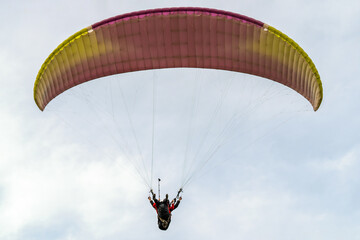 Tourist paragliding over the Turkish Pamukkale