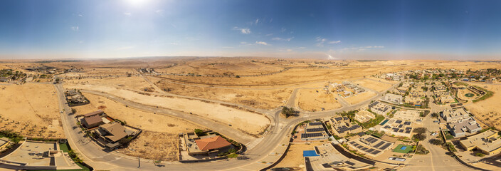 360 dgree panorama from sky of village Tlalim in Negev desert - obrazy, fototapety, plakaty