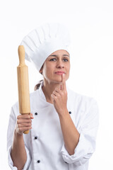 Portrait of young Caucasian chef thinking what dish she will make now on white background. Vertical format.