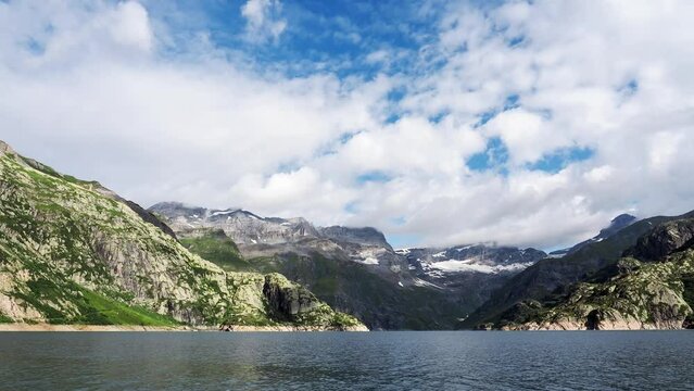 Beautiful time lapse of lake Emosson in Switzerland Alps.	