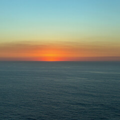 beautiful sunset over the endless expanse of the sea as a natural background