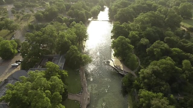 Austin Texas Barton Springs Pool Drone Aerial descending in Early Sunrise