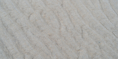 Fototapeta na wymiar close up of a texture sand background pattern 