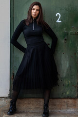 Obraz premium Beautiful young woman portrait in urban part of city