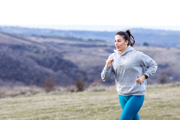 Sporty woman exercise and stretch in natural field before jogging