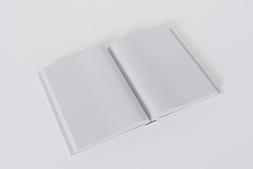 Mockup of a rectangular open book with a blank glossy, white cover on white background. Isolated with clipping path.