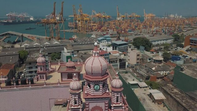 aerial drone shot of the famous Red Mosque (Jami Ul-Alfar Mosque) in the capital city of Colombo, Sri Lanka