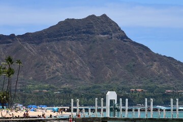 The unique profile of Diamond Head (Lē‘ahi) sits rises above the eastern edge of Waikiki’s...