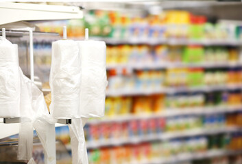 Choosing food from shelf in supermarket,vegetables in grocery section,Grocery stores