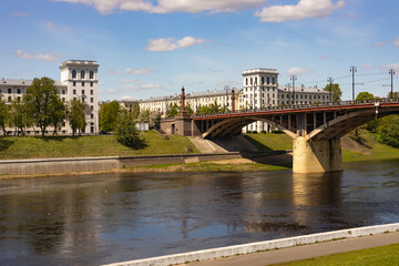 Panorama of the city, bridge over the river, park.