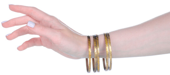 female stack bangles bracelet on female hand on white background isolation