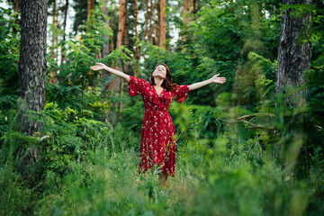Connecting with nature benefits mental health. Nature Therapy Ecotherapy Helps Mental Health. Nature Impact Wellbeing. Woman in red dress enjoying nature